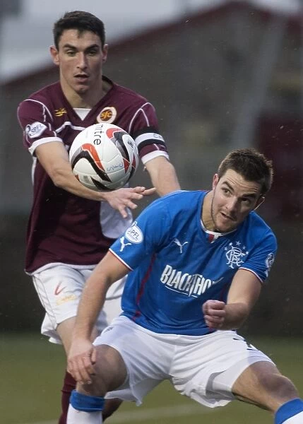 Rangers Andy Little Faces Off Against Stenhousemuir's Ross McMillan in Scottish League One Clash (2014)