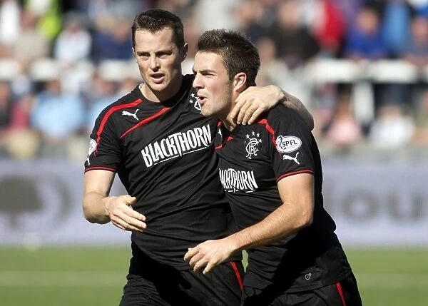 Rangers Andy Little and Jon Daly: Unstoppable Duo Celebrates Goal Against Forfar Athletic in SPFL League 1 (Forfar 0-1 Rangers)