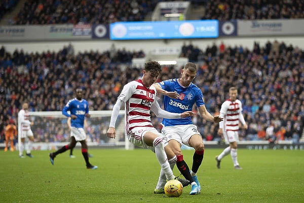 Rangers Barisic Fights for Ball in Dominant 5-0 Premiership Win over Hamilton