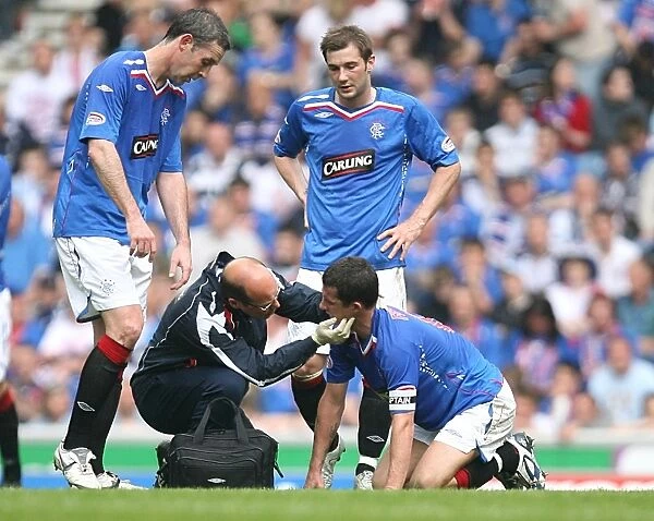 Rangers Barry Ferguson Receives On-Pitch Medical Attention After Collision with Dundee United (3-1)