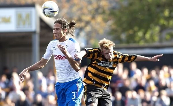 Rangers Bilel Mohsni Fights for Aerial Supremacy Against Alloa Athletic