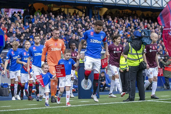 Rangers Captain James Tavernier Celebrates with Mascots: Reliving the Glory of the 2003 Scottish Cup Triumph