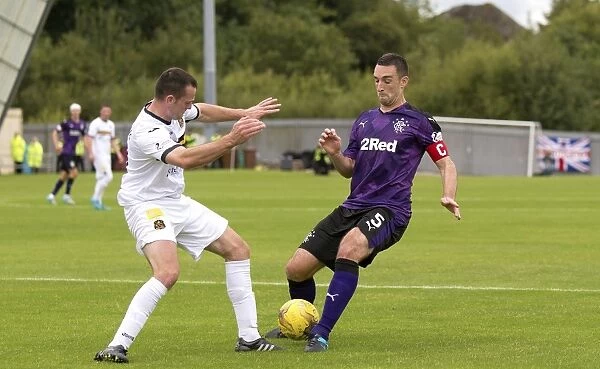 Rangers Captain Lee Wallace Leads Team in Ladbrokes Championship Match at Dumbarton's The Cheaper Insurance Direct Stadium
