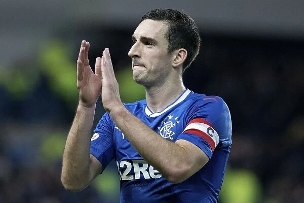 Rangers Captain Lee Wallace Salutes Adoring Fans Amidst the Excitement of Rangers vs. Heart of Midlothian at Ibrox Stadium