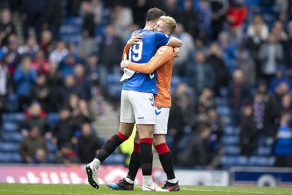 Rangers Celebrate Dramatic Win Against Hibernian: Ross McCrorie and Nikola Katic Rejoice after Allan McGregor's Red Card (Scottish Premiership, Ibrox Stadium)