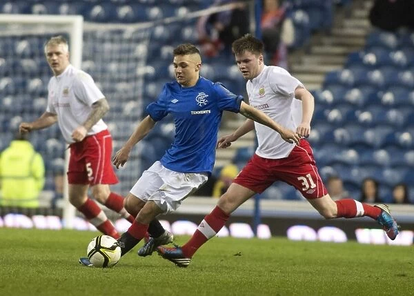 Rangers Charlie Telfer in Action: 2-0 Lead over Linfield at Ibrox Stadium