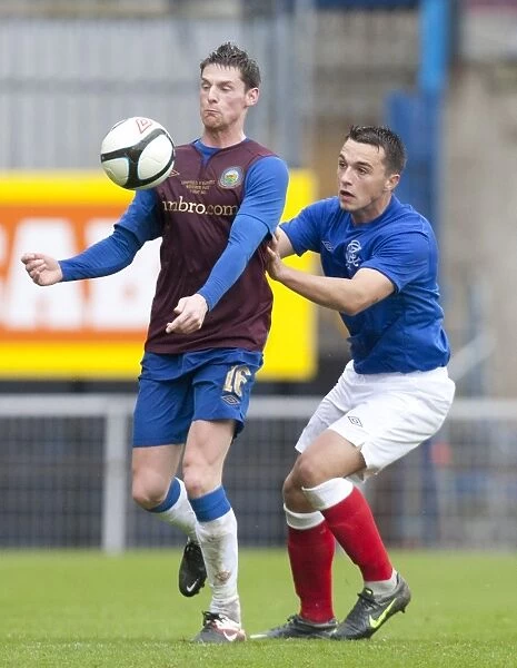 Rangers Chris Hegarty and Daryl Fordyce Clash as Rangers Take 2-0 Lead Over Linfield at Windsor Park