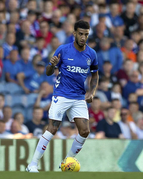 Rangers Connor Goldson Honors Past Glory at Ibrox Stadium during Pre-Season Friendly vs Bury (Scottish Cup Champions 2003)