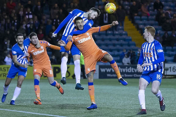 Rangers Connor Goldson Leaps Over Kirk Broadfoot in Fifth Round Scottish Cup Clash at Rugby Park