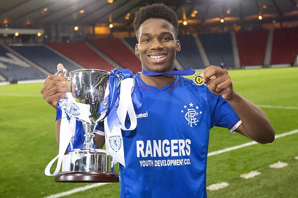 Rangers Dapo Mebude Lifts the Scottish FA Youth Cup after Victory over Celtic at Hampden Park (2003)