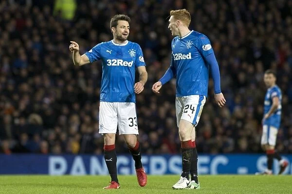 Rangers: Deep in Thought - Martin and Bates in Intense Conversation at Ibrox Stadium