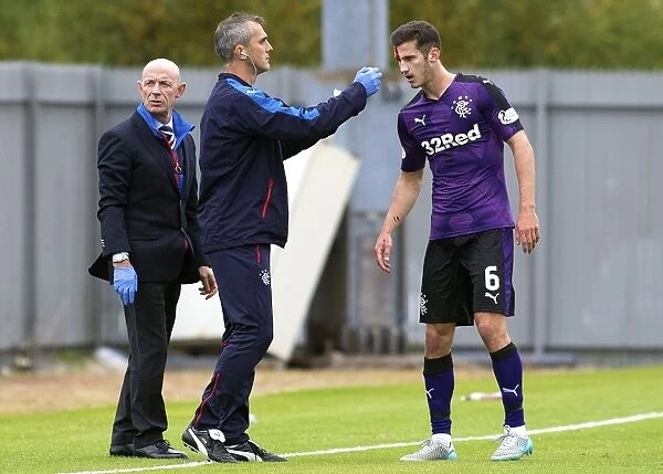 Rangers Dominic Ball Receives On-Field Medical Attention for Head Wound During Ladbrokes Championship Match
