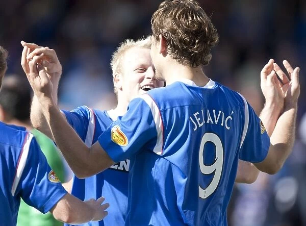 Rangers Double Trouble: Naismith and Jelavic's Four-Goal Rampage Against Dunfermline (Clydesdale Bank Premier League)