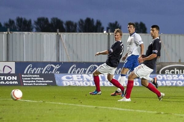 Rangers Take Early Lead: Andy Little Scores Against Falkirk in Ramsden Cup (0-1)