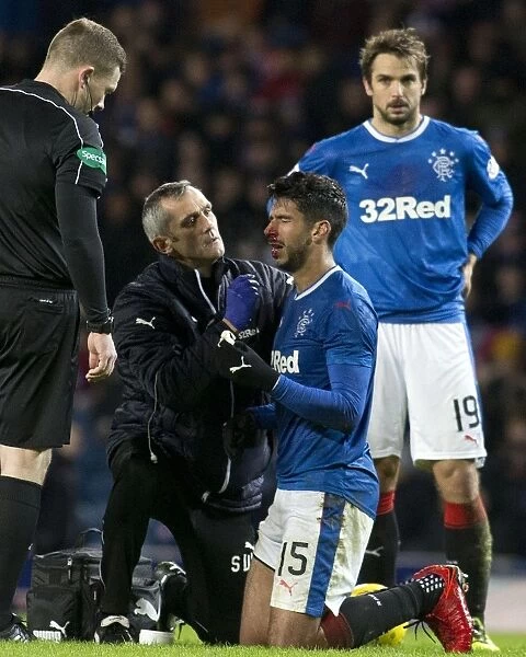 Rangers Eduardo Herrera Receives Medical Treatment for Bloody Nose During Rangers vs Motherwell Match at Ibrox Stadium