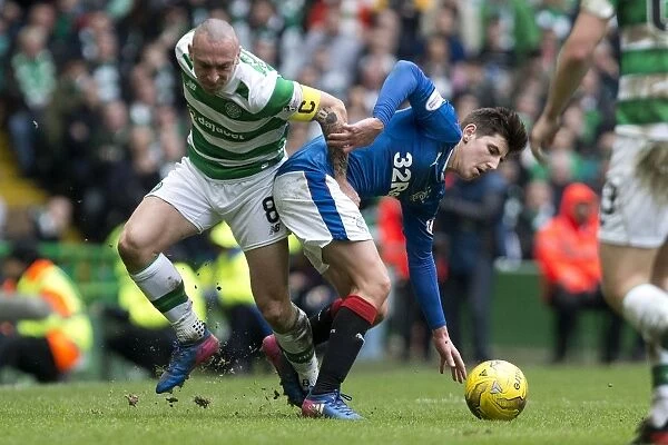Rangers Emerson Hyndman vs. Celtic's Scott Brown: A Battle for Ball Possession in the Ladbrokes Premiership