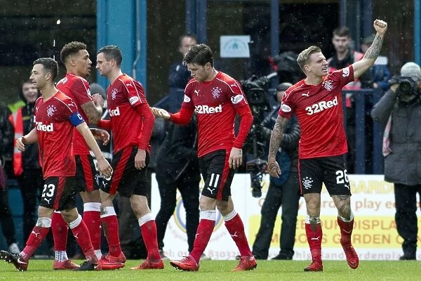Rangers Euphoric Victory: Jason Cummings Scores and Celebrates with Team Mates in Ladbrokes Premiership Win over Ross County