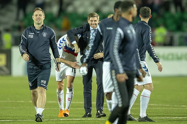 Rangers Europa League Play-Off Victory: Steven Gerrard and Andy Halliday Celebrate at Neftyanik Stadium against FC Ufa