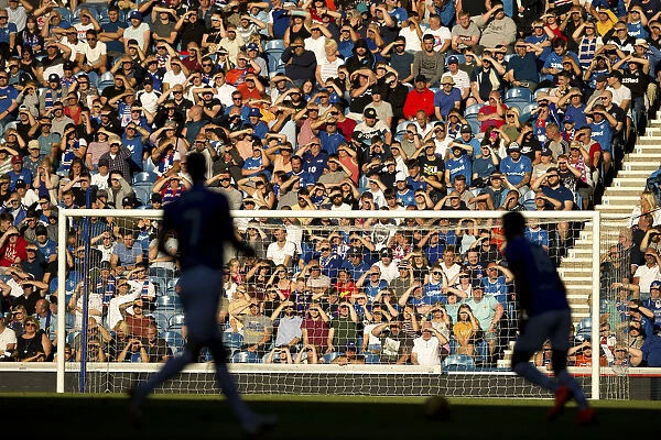 Rangers Fans Bask in Glory: Sunshine-Filled Ibrox Stadium During Pre-Season Friendly (Scottish Cup Winning Moment)