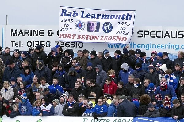 Rangers Fans Honor Rab Learmonth at Balmoor Stadium: A Moment of Silence During Peterhead vs Rangers (0-1)