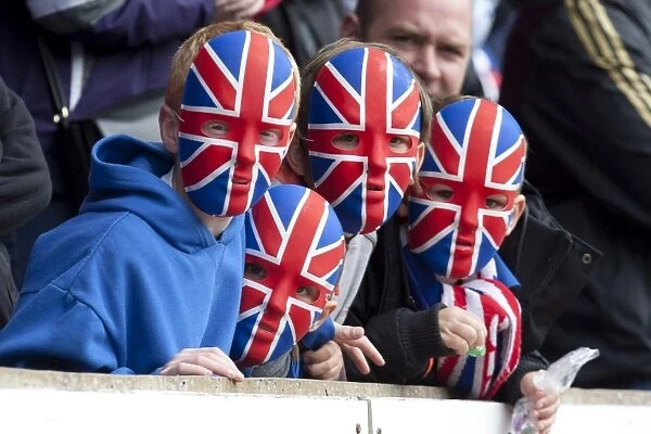 Rangers Fans in Masks: 4-0 Victory Celebration at McDiarmid Park against St. Johnstone (Scottish Premier League)