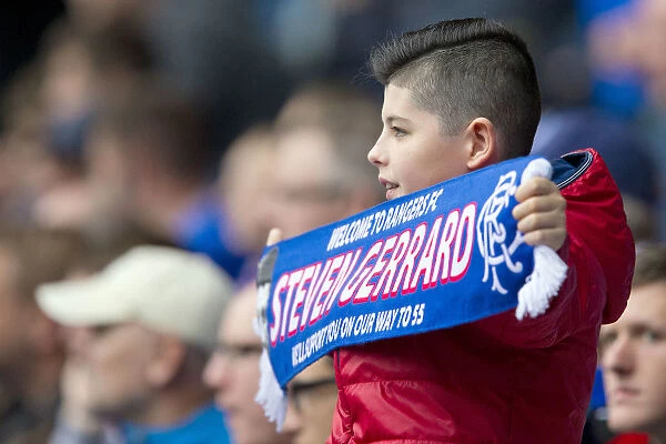 Rangers Fan's Passionate Moment: Scarf Wave at Ibrox Stadium during Rangers vs St Mirren Match
