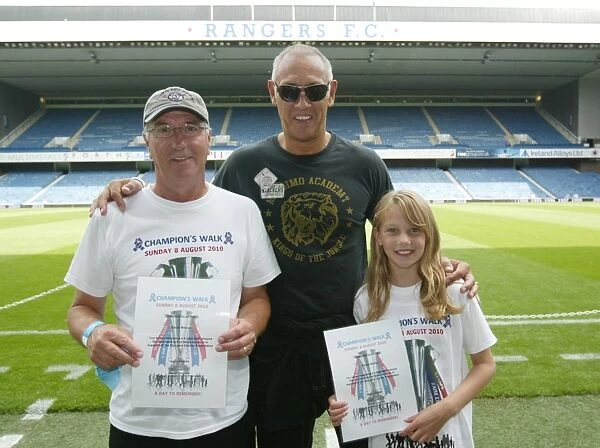 Rangers Fans receive their certificates from Mark Hateley for completing the walk