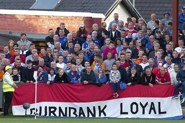 Rangers Fans Triumph: Celebrating at Ochilview Park during Betfred Cup Victory against East Stirlingshire