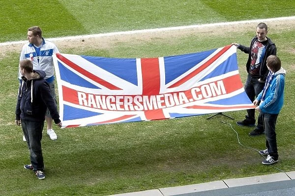 Rangers Fans United: A Sea of Flags at Ibrox Stadium - Passionate Parade During Rangers vs Motherwell Match (0-0)