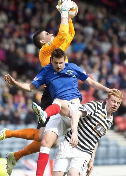 Rangers Faure vs. Parry: Battling for the Ball in Rangers 4-1 Irn-Bru Scottish Third Division Victory at Hampden Stadium