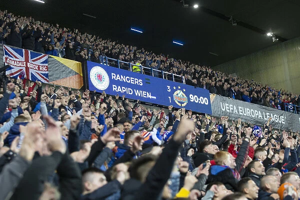 Rangers FC Celebrate Europa League Victory Over Rapid Vienna: Ibrox Stadium Erupts in Cheers (Scottish Cup Champions 2003)