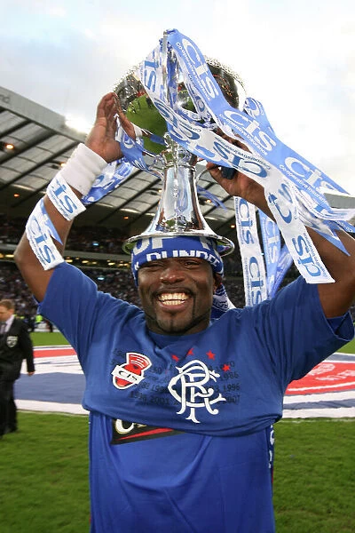 Rangers FC: Jean-Claude Darcheville Lifts the CIS Cup after Victory over Dundee United at Hampden Park (2008)