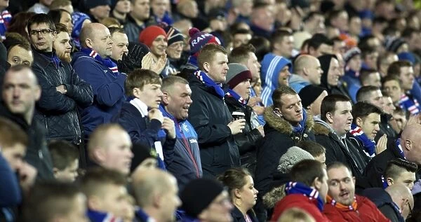 Rangers FC: A Sea of Passionate Fans at Ibrox Stadium Roaring for Victory against Queen of the South (Scottish Cup Champions 2003)