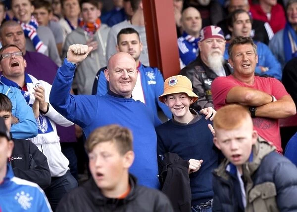 Rangers FC: Thrilled Fans at Ochilview Park during the Betfred Cup Match against East Stirlingshire