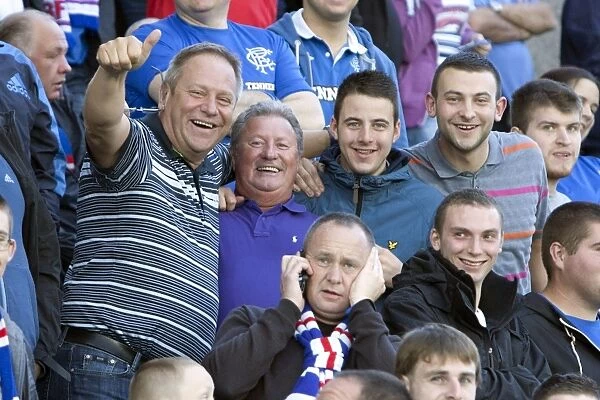 Rangers FC's Blue and White Sea at Falkirk Stadium: A 1-0 Victory (Ramsden's Cup Second Round)