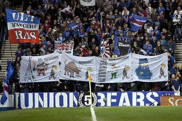 Rangers FC's Glorious Victory over Motherwell: A Sea of Fans and Flags at Ibrox Stadium (2-0)
