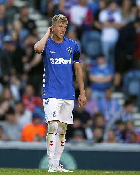 Rangers FC's Ross McCrorie Stars in Pre-Season Victory at Ibrox Stadium: A New Generation Shines for Scottish Cup Champions (2003)