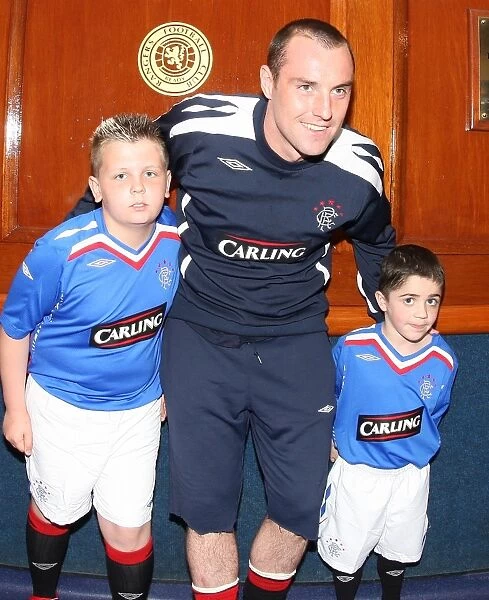Rangers FC's Triumphant Mascot: Celebrating a Glorious 3-1 Victory over Dundee United