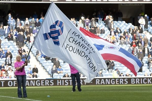 Rangers Flag Bearers Celebrate 2-0 Victory over Queens Park at Ibrox Stadium