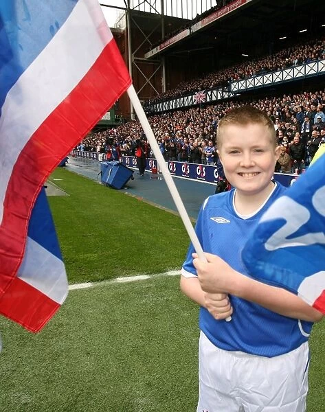 Rangers Flag Bearers Celebrate Victory: Triumphing Over Celtic 1-0 at Ibrox