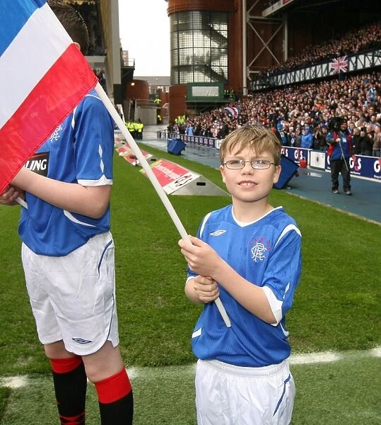 Rangers Flag Bearers Triumph: Celebrating Victory over Celtic (1-0) at Ibrox