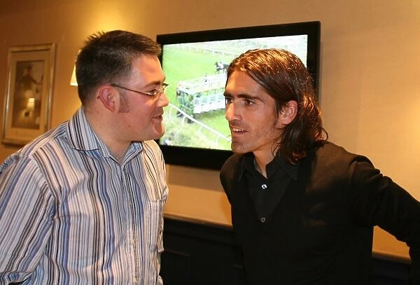 Rangers Football Club Charity Race Night 2008: Pedro Mendes Interacts with Fan in Thornton Suite
