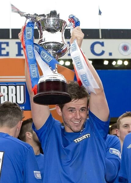 Rangers Football Club: David Templeton Celebrates Promotion to Third Division with Irn Bru Trophy Lift at Ibrox Stadium