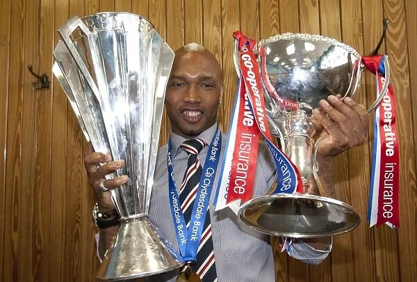 Rangers Football Club: El Hadji Diouf Celebrates SPL and League Cup Double Victory (2010-11)