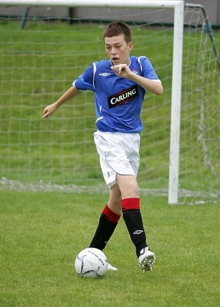 Rangers Football Club: Empowering Young Footballers at Garscube Kids Soccer Camp, FITC (Football in the Community)