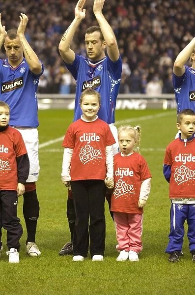Rangers Football Club: Exciting 2-1 Win with Cash the Mascot for Cash for Kids Charity Event