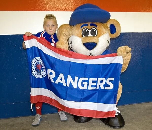 Rangers Football Club: Family Fun in the Broomloan Stand Celebrating a 4-0 Victory over Hearts (Clydesdale Bank Scottish Premier League)