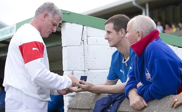 Rangers Football Club: Ian Durrant Engages with Fans at Buckie Thistle's Victoria Park - Scottish Cup Victory (2003)