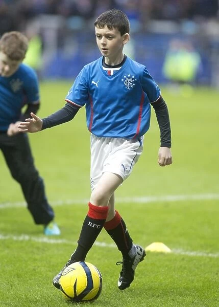 Rangers Football Club: Inspiring Young Soccer Stars at Ibrox Stadium during Scottish League One Match against Dunfermline Athletic
