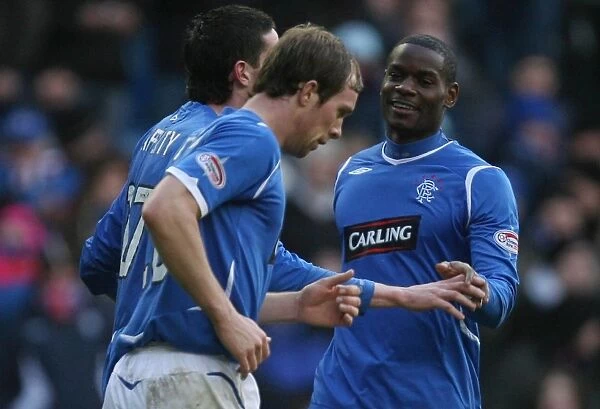 Rangers Football Club: Kyle Lafferty's Double Strike - A Glorious 5-1 Homecoming in the Scottish Cup Quarterfinals vs Hamilton (Maurice Edu's Jubilant Celebration)